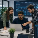 IT team collaborating on self-managing system analytics dashboard in modern office